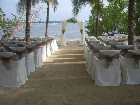 https://www.jamaica-reggae-music-vacation.com/Beach-Jamaica-Wedding.html, Wedding decorations on the beach at Riu, Negril, Jamaica